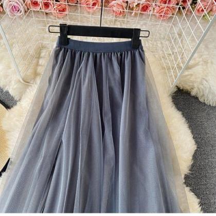 Elastic waist irregular mesh skirt,..