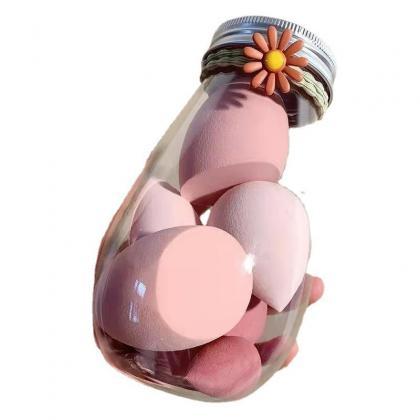 Soft And Hygienic Cosmetic Puffs In Bottle..