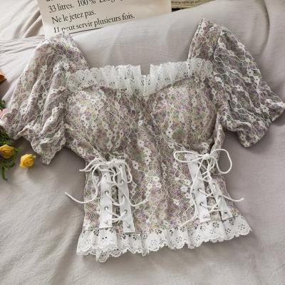 Splicing hollow, lace bubble sleeves, small shirt with chest pad, waist tie floral top