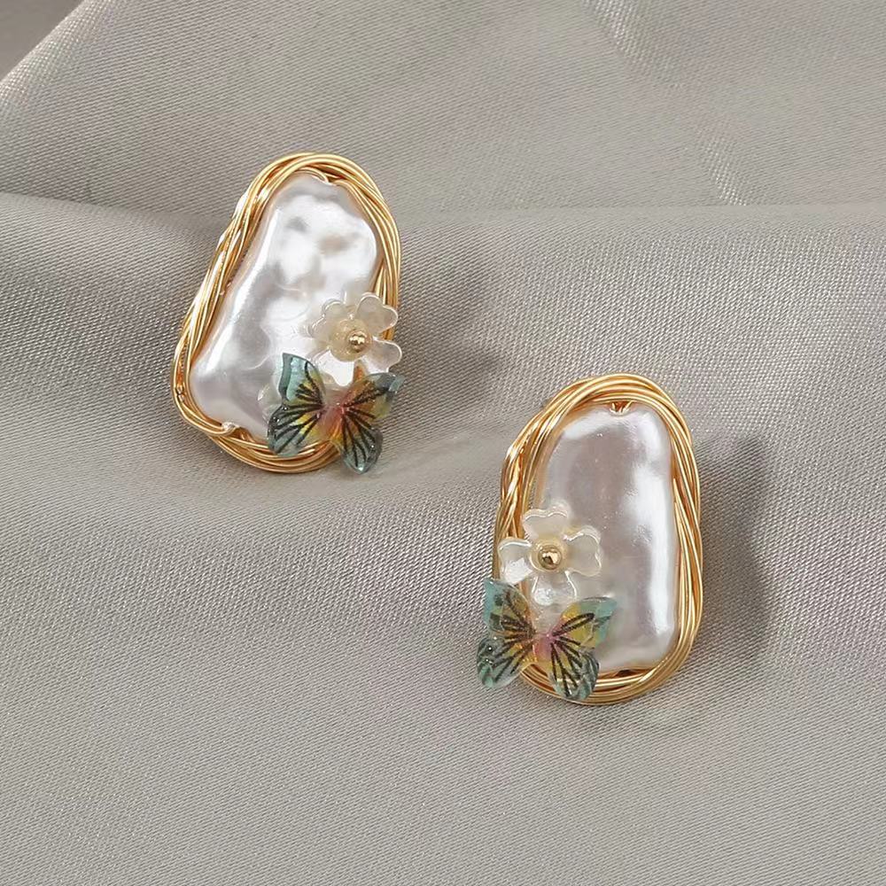 Handmade winding, temperament,vintage, exquisite earrings, baroque, pearl butterfly creative fashion earrings, wholesale