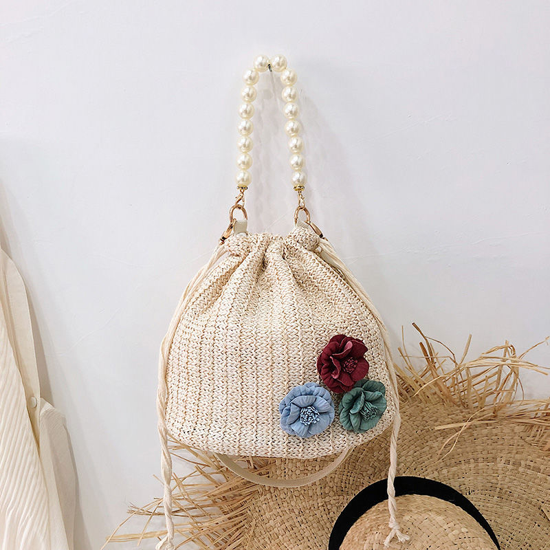 Straw woven bag, new style, sweet braiding bucket handbag, temperament cross-body bag