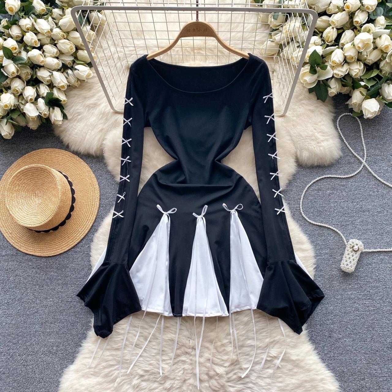 Black dress with white accents top
