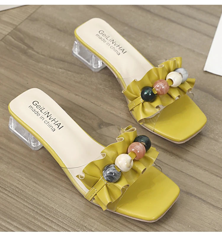 Yellow ruffle sandals top