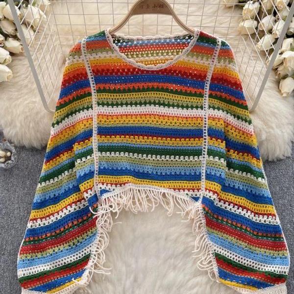 Lazy holiday style color knitted hollow tassel design long-sleeved top for women